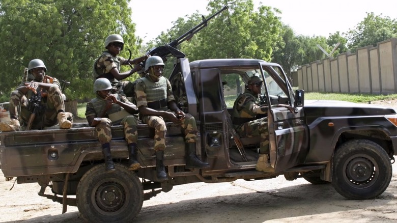 Toyota truck technical with soldiers