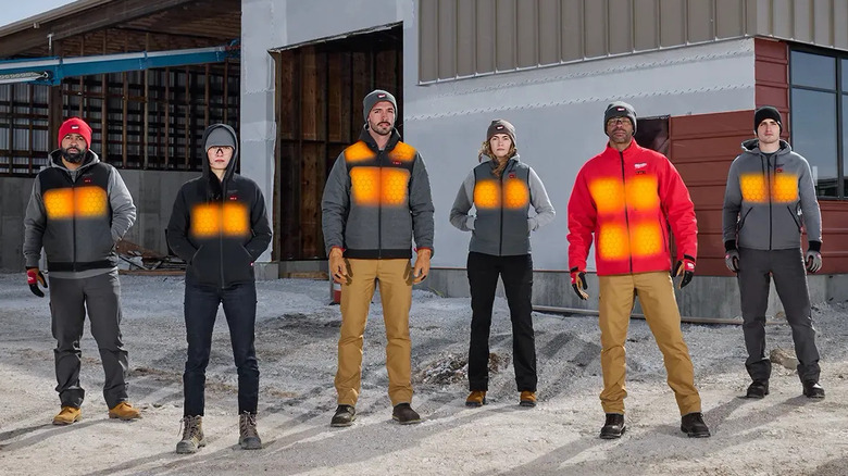 Models wearing Milwaukee heated vests and jackets