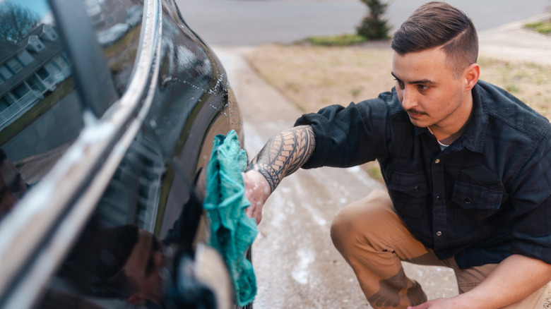 Drying a car with a microfiber cloth