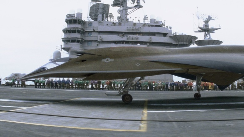 Stealth fighter on aircraft carrier