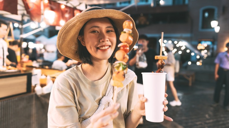 foodie traveler enjoying some kebabs