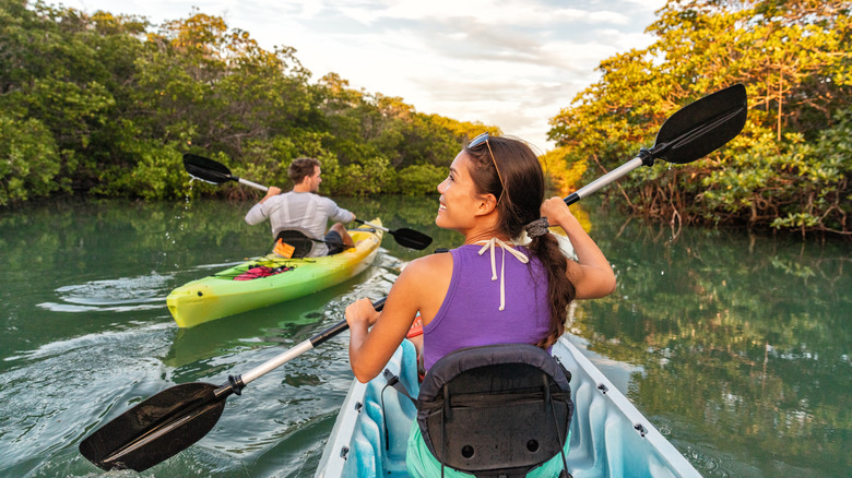 couple kayaking river