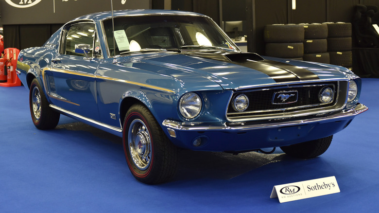 blue Ford Mustang on auction block