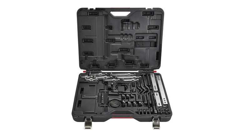 A tool box with a mechanic puller set inside