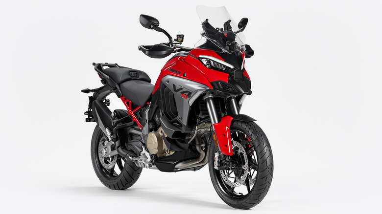 Red and silver Ducati Multistrada V4 S studio photo