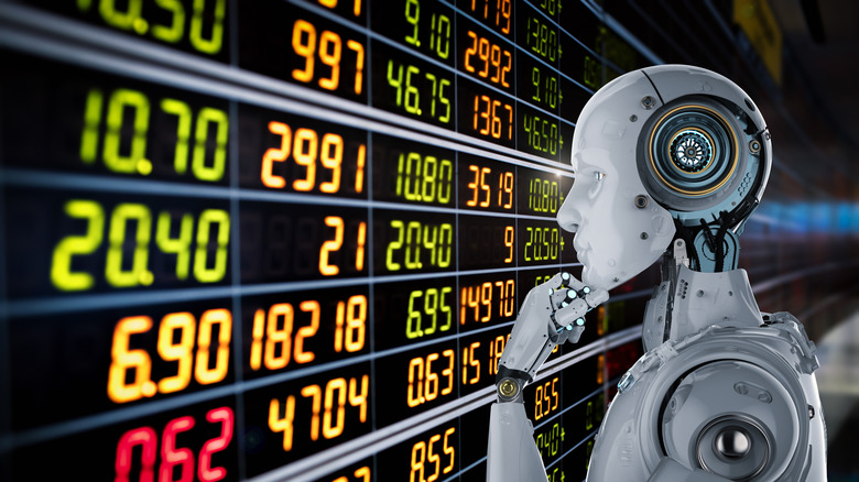 A robot looking at visualizations of stock market data