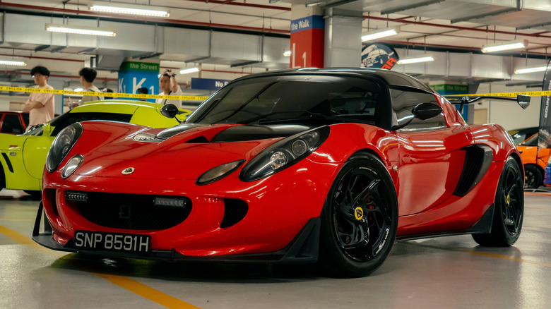 Red Lotus Elise at a car show