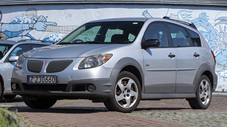 Silver Pontiac Vibe parked