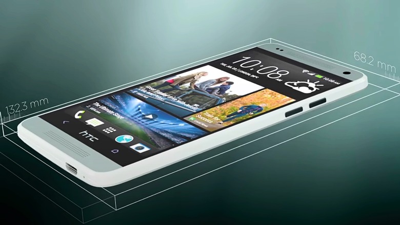 An HTC One Mini with measurements