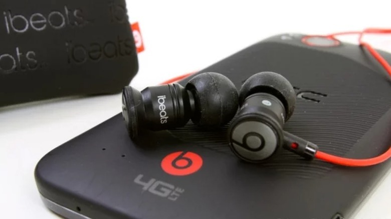 An HTC Rezound with Beats Audio headphones.