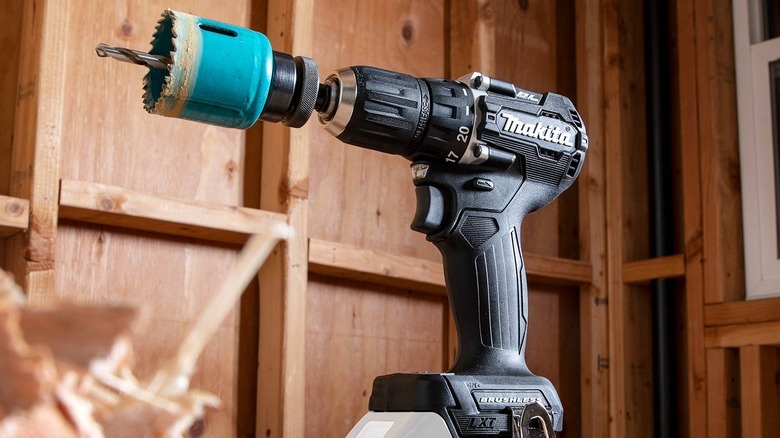 Makita drill with bore attachment