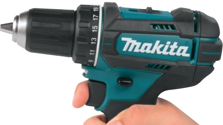 Makita drill in person's hand