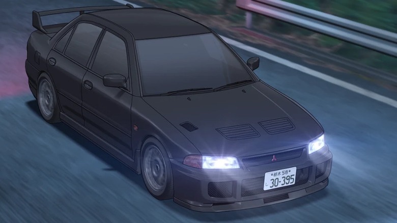 Mitsubishi Lancer driving at night