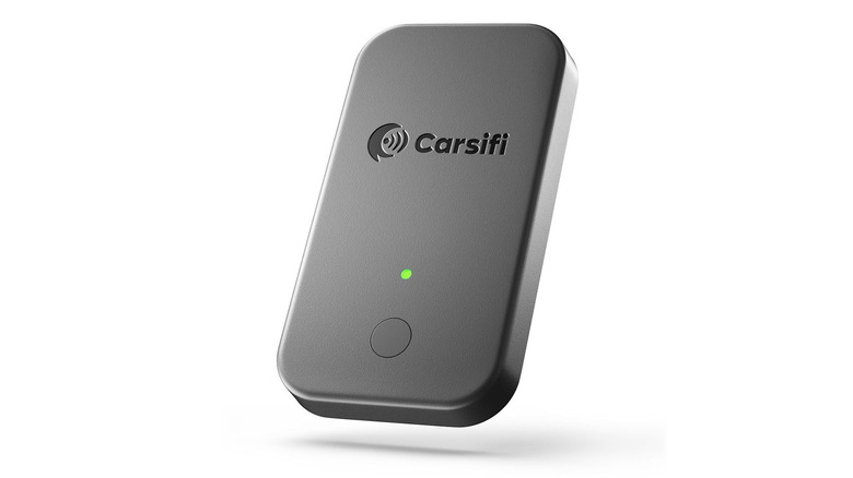 A Carsifi wireless Android Auto adapter