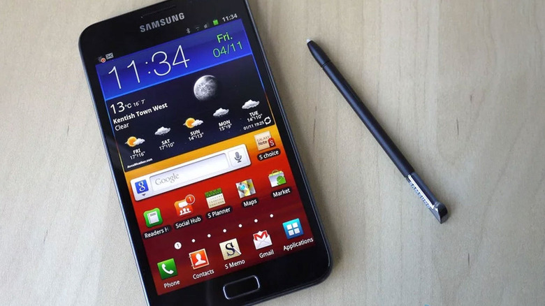 Galaxy Note smartphone and stylus on a table