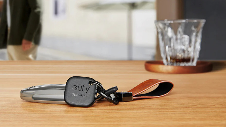 Eufy tracker attached to keyring on a table