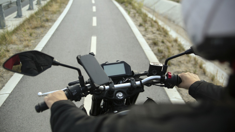 a phone mounted on a bike