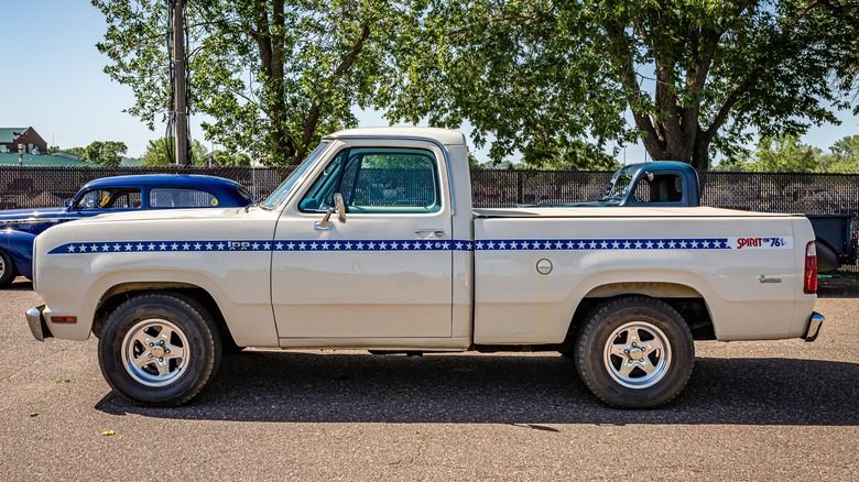 High perspective side view of a 1975 Dodge D100 Pickup Truck