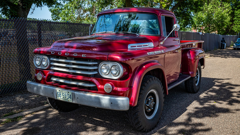 High perspective front corner view of a 1958 Dodge W-100 Power Wagon Pickup Truck