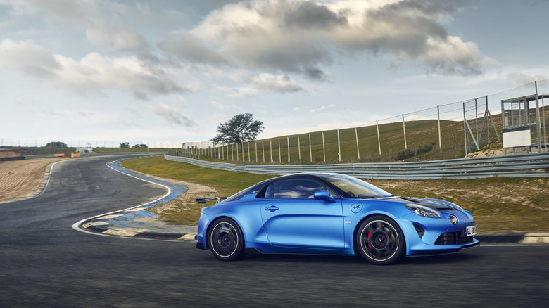 Blue Alpine A110 R driving on track