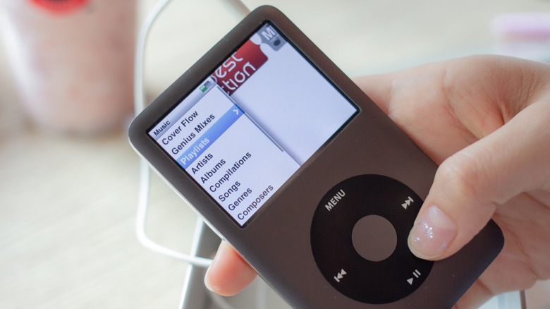 Selecting a song on an iPod classic.