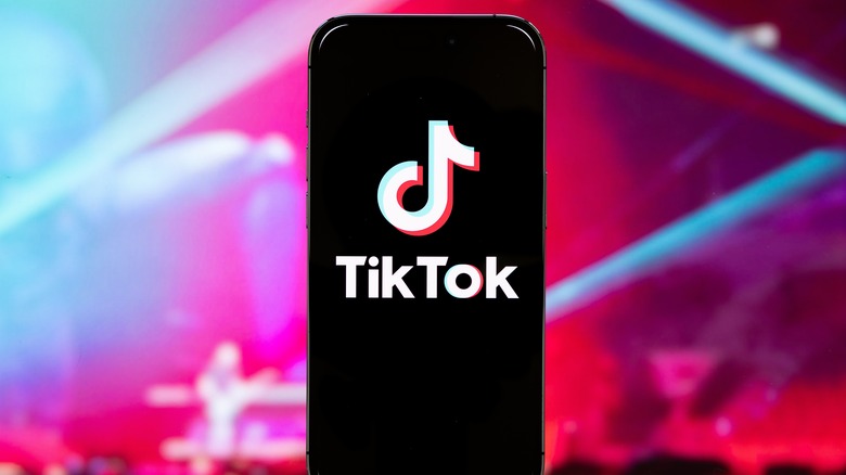Smartphone with TikTok on screen