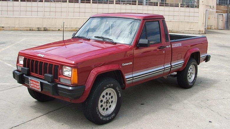 a red Jeep Comanche Eliminator