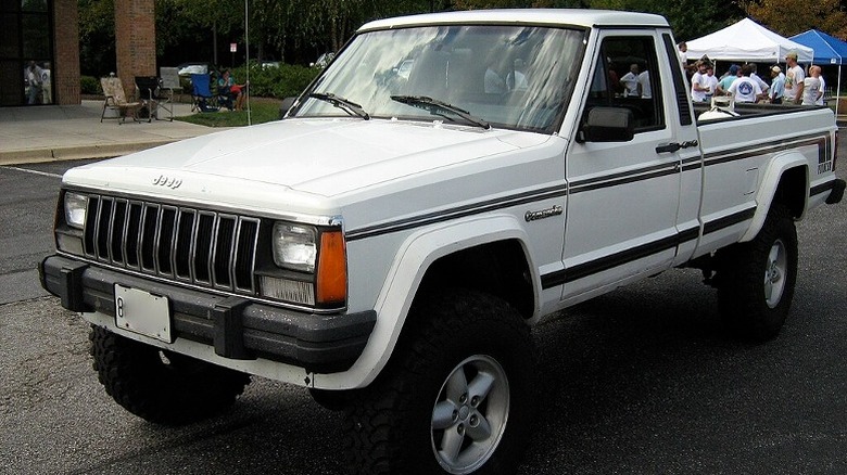 a white Jeep Comanche Pioneer