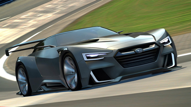 A Subaru VIZIV GT in Gran Turismo 6, gray exterior, front 3/4 view, driving on the race track