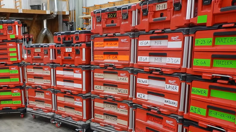 multiple portable toolboxes with labels