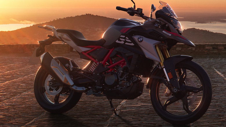 A BMW G 310 GS parked at sunset