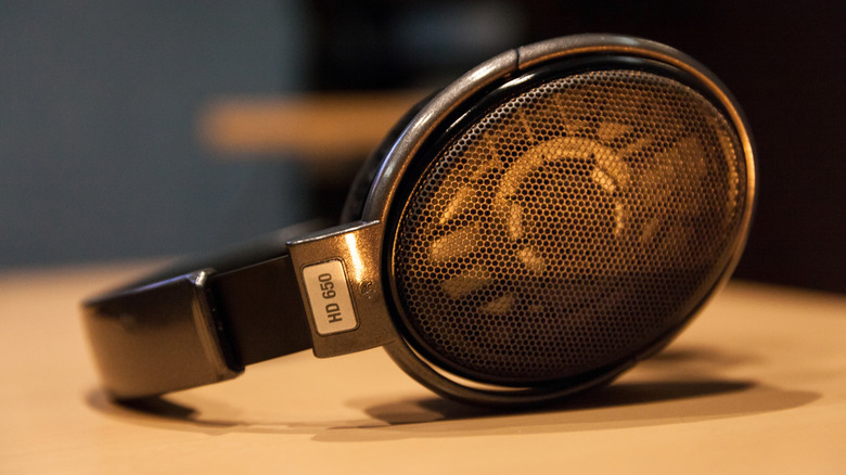 A pair of Sennheiser HD650s on a table