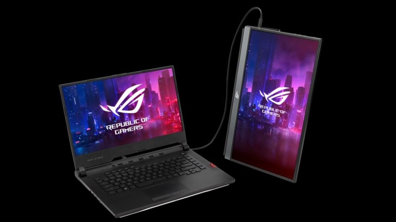 ASUS ROG Strix Portable Gaming Monitor connected to gaming laptop