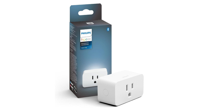 A Philips Hue smart plug with its box