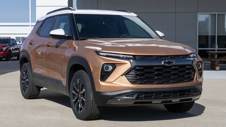 A bronze 2024 Chevy Trailblazer on a dealership lot