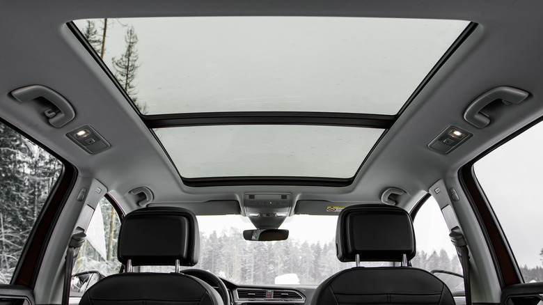 A panoramic sunroof shown from the backset looking up