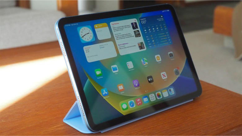 An Apple iPad in a folio case on a coffee table