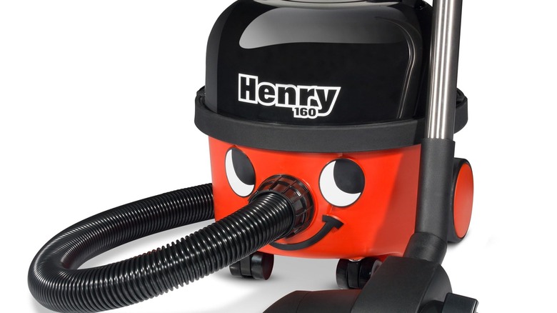 red and black NaceCare Canister vacuum