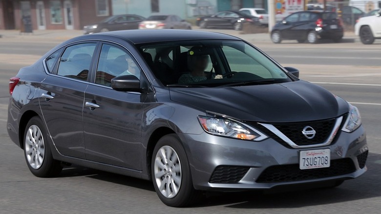 Silver 2017 Nissan Sentra driving