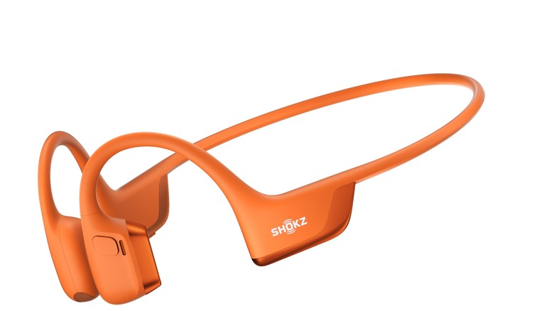 Shokz OpenRun Pro 2 headphones in orange on display