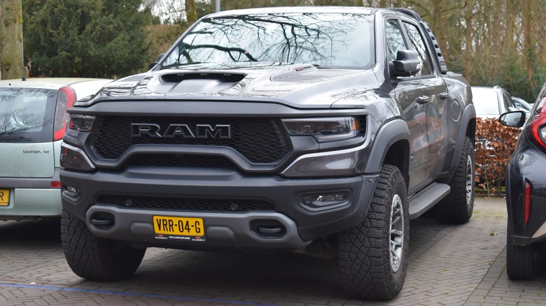 A grey 2022 Ram truck 1500 TRX parked in a parking lot