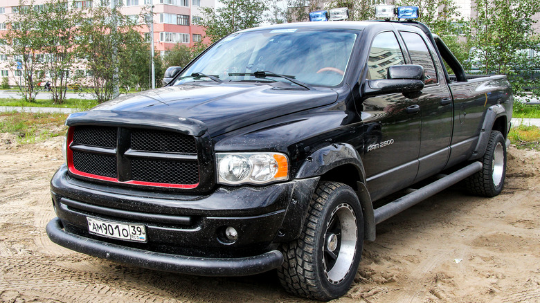 A black 2012 Ram 2500 parked in the city streets