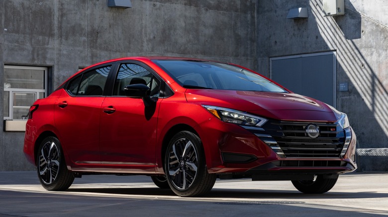 Red 2025 Nissan Versa parked