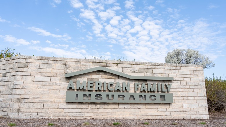 American Family Insurance logo on a brick wall