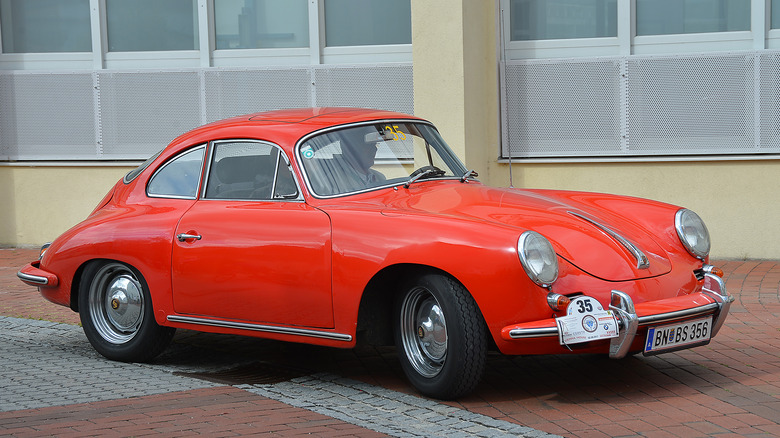 A Porsche 356 B in red, front 3/4 view