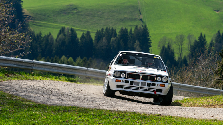 The Lancia Delta HF Integrale on the move on a rally stage, front view