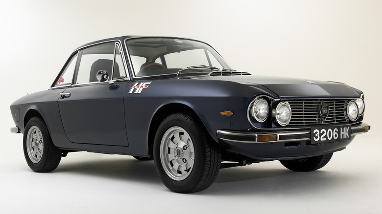 The Lancia Fulvia 1600 HF in navy blue, front 3/4 view