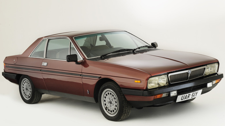 A Lancia Gamma Coupe in maroon, front 3/4 view