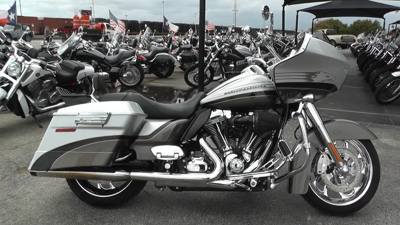 Silver 2009 Harley Davidson CVO Road Glide in parking lot