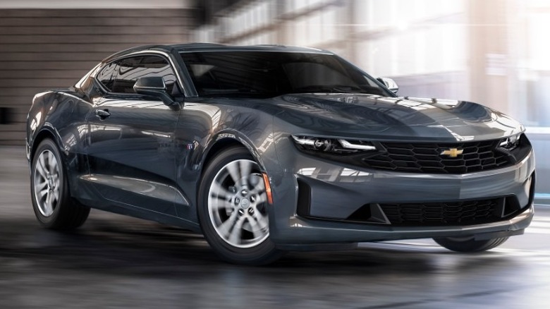 2023 Chevy Camaro driving in lot